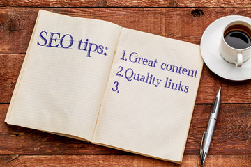 SEO tips in a notebook with coffee