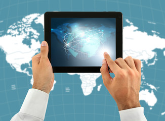 Human holding tablet pc  with world map and network on screen