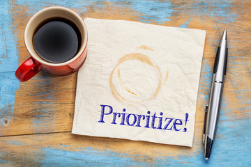 prioritize - reminder on a napkin