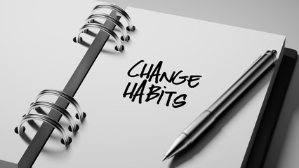 Closeup of a personal agenda setting an important date writing w