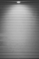 Background and texture of White door shutter at night
