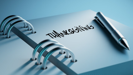 Closeup of a personal agenda setting an important date writing w