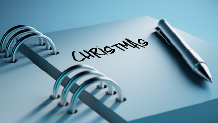 Closeup of a personal agenda setting an important date writing w