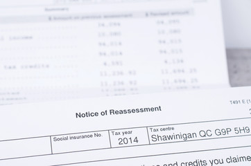 Canadian Tax Notice of reassessment with calculation sheet in th
