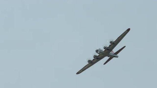 B-17 Flying Fortress, World War II bomber, banking close to camera.  Recorded in 4K, ultra high definition.