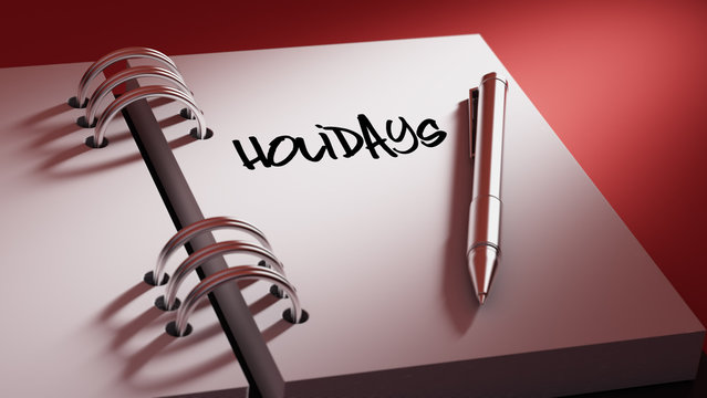 Closeup of a personal agenda setting an important date writing w