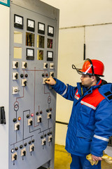 Electricians on high voltage substation