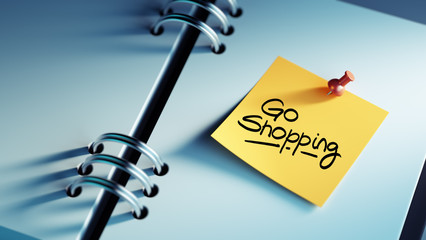 Closeup Yellow Sticky Note paste it in a notebook setting an app