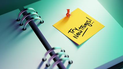 Closeup Yellow Sticky Note paste it in a notebook setting an app