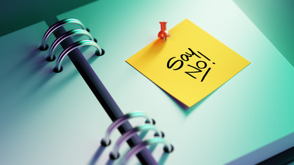 Closeup Yellow Sticky Note paste it in a notebook setting an app