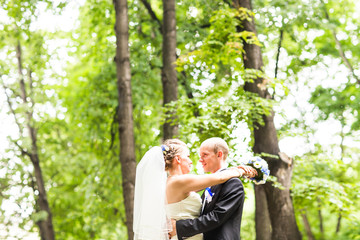 Beautiful bride and groom is enjoying wedding