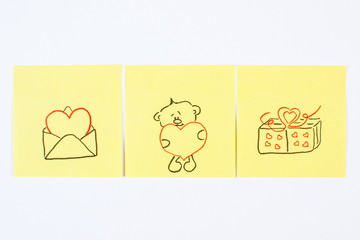 Symbols of Valentines Day drawn on paper, symbol of love