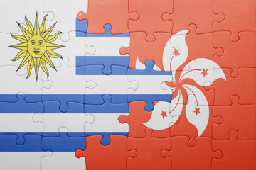 puzzle with the national flag of uruguay and hong kong