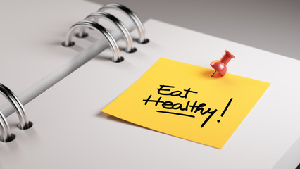 Closeup Yellow Sticky Note paste it in a notebook setting an app