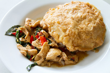 stir fried chicken with basil leaf and deep fried egg, asian str