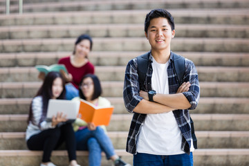 Obraz premium group of happy teen high school students outdoors