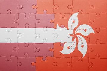 puzzle with the national flag of latvia and hong kong