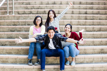 Fototapeta premium group of happy teen high school students outdoors