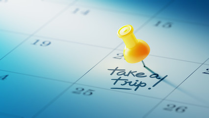 Concept image of a Calendar with a yellow push pin. Closeup shot