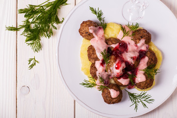 Swedish Meatballs with lingonberry cream sauce