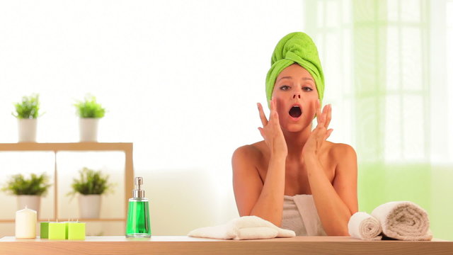 Overweight man scares woman doing beauty treatment at health spa 