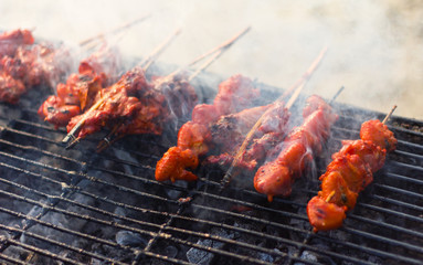 Grilled chicken skewers smoked.