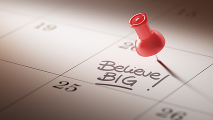 Concept image of a Calendar with a red push pin. Closeup shot of