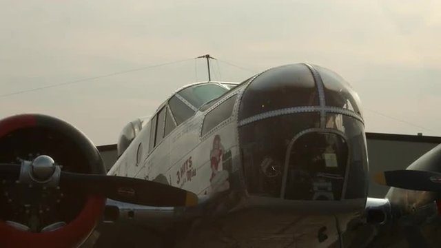 Military version of the Beechcraft AT-11 Kansan, the C-45 Expeditor used by USAAF during World War II.  Tilt to cockpit at dawn.  Recorded in 4K, ultra high definition.