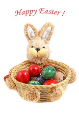 Easter bunny rabbit with decorated Easter eggs.