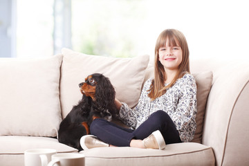 Cute girl and her little dog