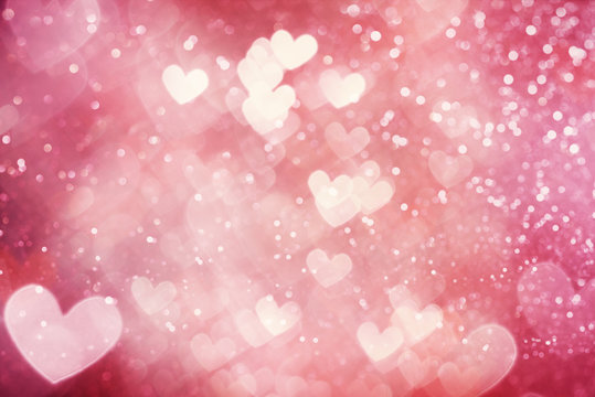 Heart shaped defocused lights background on Valentines day