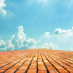 brick way on blue sky background