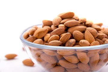 almonds in glass bowl