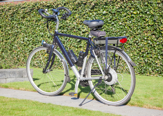 Fototapeta na wymiar Electric bicycle in the sun