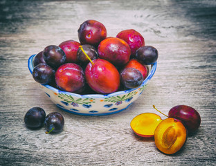 vase with plums