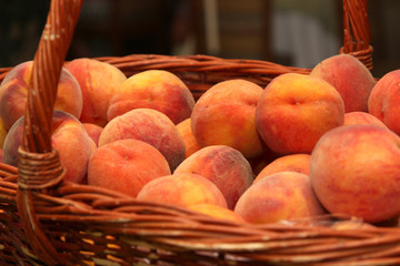 ripe peaches in a basket