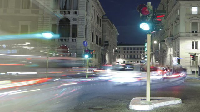 Nighttime time-lapse of a busy street in Rome. Cropped.