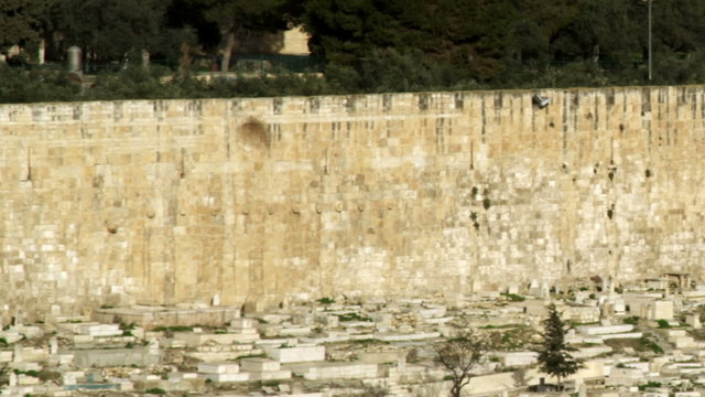 Stock Video Footage of the Muslim Cemetery and Golden Gate of Jerusalem filmed in Israel at 4k with Red.