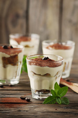 Traditional italian cake tiramisu with cookie and coffee