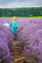Lavender girl.
Beautiful little girl on the background of a lavender field.
