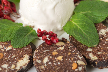 Sliced chocolate and biscuit cake.