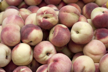 Peaches for sale on market stall