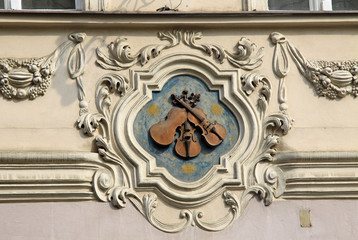 Fototapeta na wymiar PRAGUE, CZECH REPUBLIC - APRIL 23, 2013: House sign in Mala strana (Lesser town)