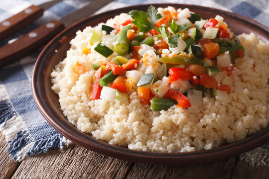 Arabic cuisine: couscous with vegetables close-up. horizontal

