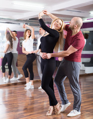 people having dancing class