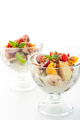 Fruit salad on the white background vertical