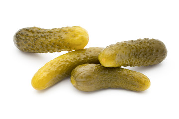 Pickled cucumbers isolated on white background.