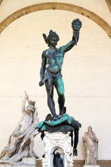 Perseus with the Head of Medusa by Benvenuto Cellini (1545) in the Loggia dei Lanzi in Florence, Italy. In the background Pio Fedi's The Rape of Polyxena (1865)