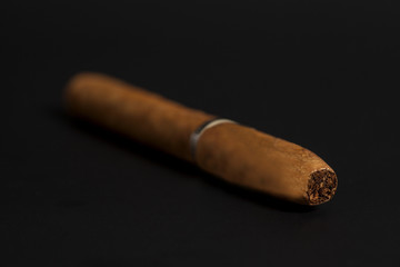 Cuban cigar on black background