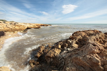 Fototapeta na wymiar rock beach in Santa Pola, Alicante, Spain 
